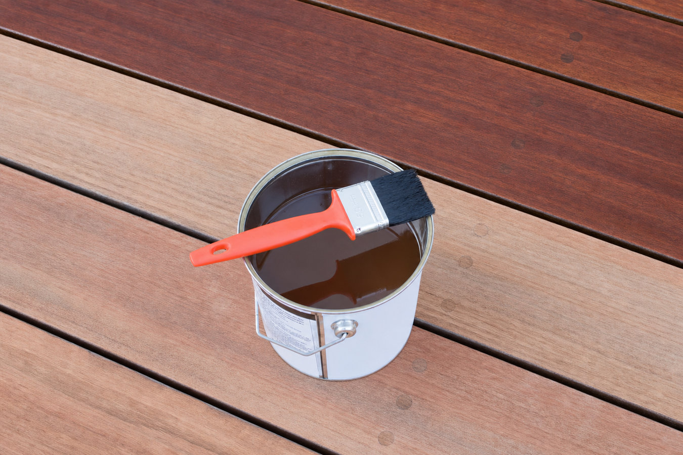 Fence staining and sealing